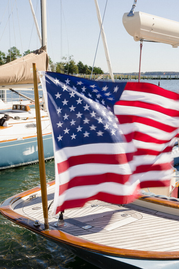 Catherine and Taylor’s fall wedding ceremony at the Inn at Perry Cabin in St. Michaels Maryland overlooking the Chesapeake Bay
