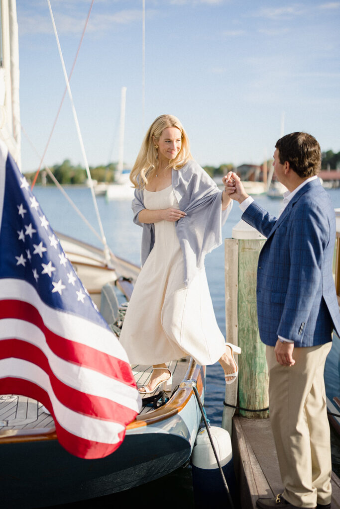 Chesapeake Bay engagement session with Catherine and Taylor sailing during their Maryland waterfront engagement photos