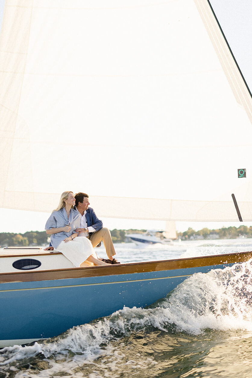 Chesapeake Bay engagement session with Catherine and Taylor sailing during their Maryland waterfront engagement photos