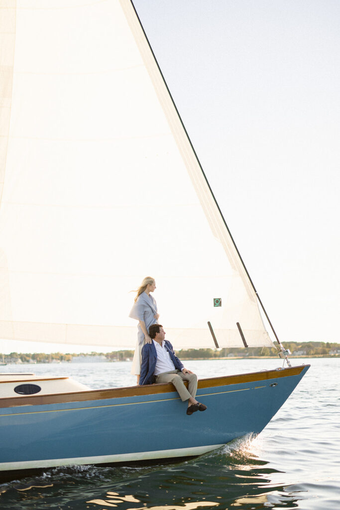 Chesapeake Bay engagement session with Catherine and Taylor sailing during their Maryland waterfront engagement photos