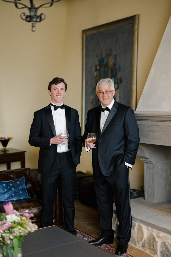 Stuart getting ready for his wedding at Villa Ardore in Chianti, Tuscany, adjusting his suit inside the Italian villa before the outdoor ceremony.