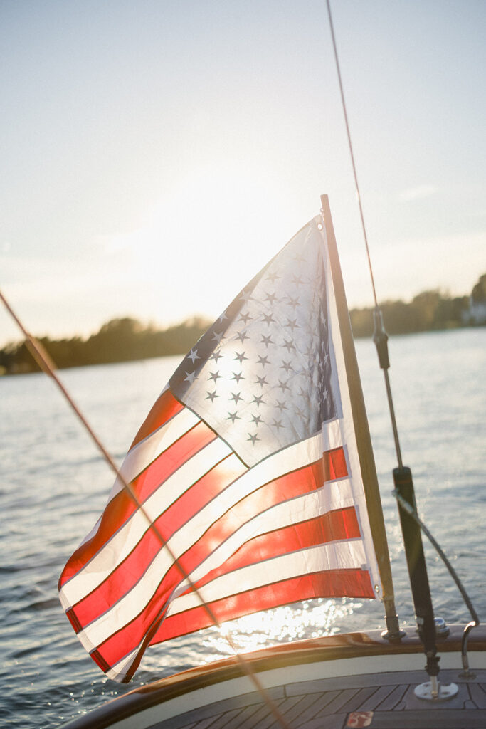 Chesapeake Bay engagement session with Catherine and Taylor sailing during their Maryland waterfront engagement photos