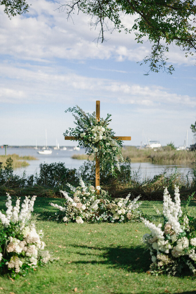 Catherine and Taylor’s fall wedding ceremony at the Inn at Perry Cabin in St. Michaels Maryland overlooking the Chesapeake Bay