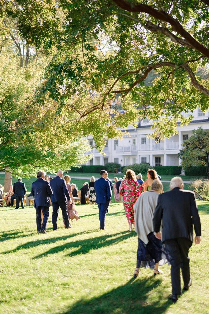 Catherine and Taylor’s fall wedding ceremony at the Inn at Perry Cabin in St. Michaels Maryland overlooking the Chesapeake Bay