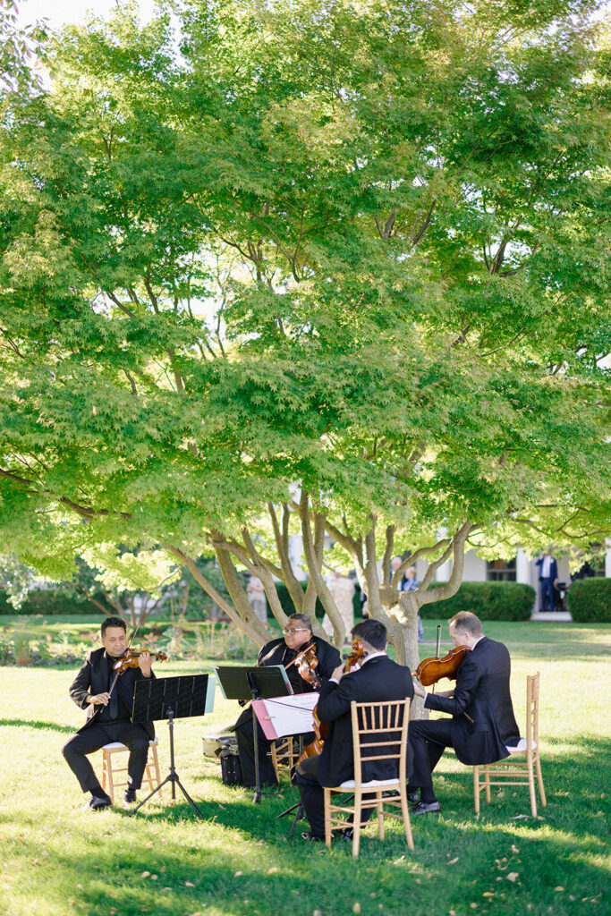 Catherine and Taylor’s fall wedding ceremony at the Inn at Perry Cabin in St. Michaels Maryland overlooking the Chesapeake Bay