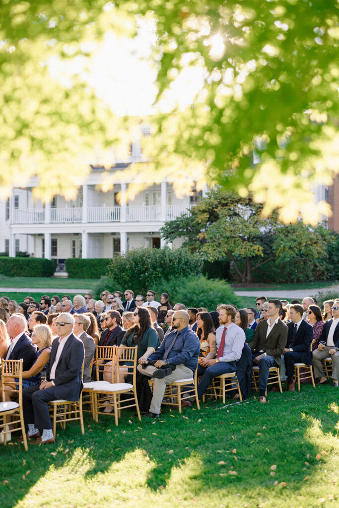 Catherine and Taylor’s fall wedding ceremony at the Inn at Perry Cabin in St. Michaels Maryland overlooking the Chesapeake Bay