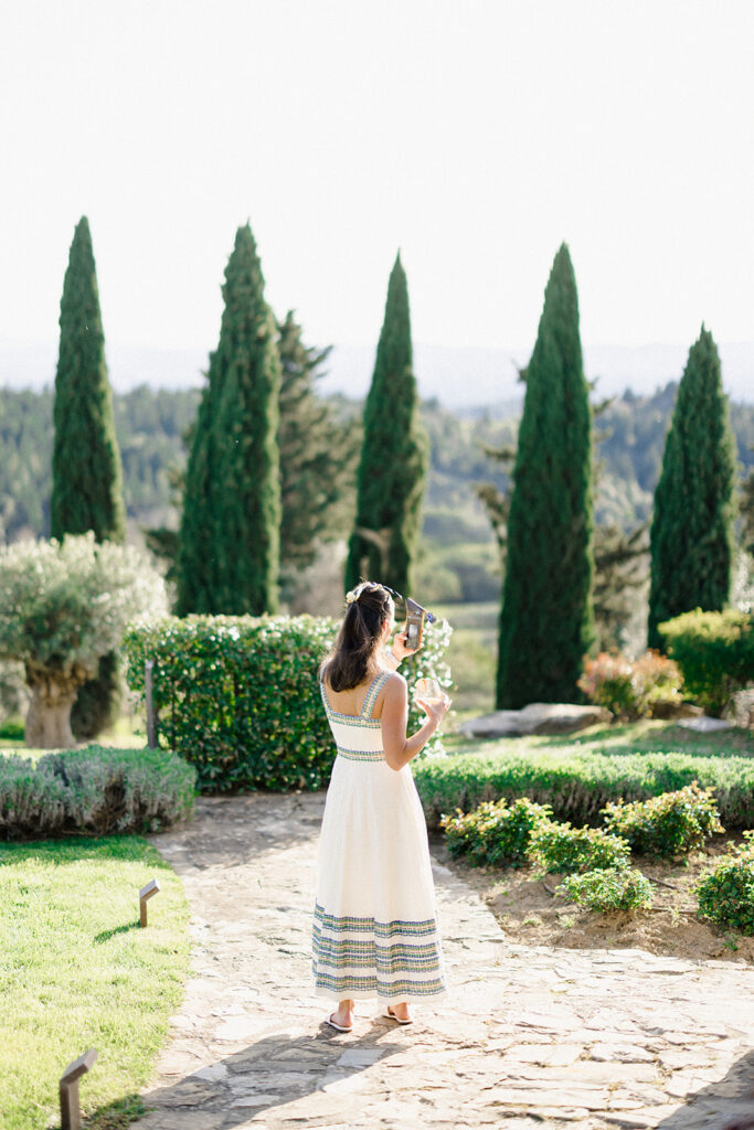 Campbell and Stuart participating in a hands-on cooking class in Italy, surrounded by family and shared laughter.