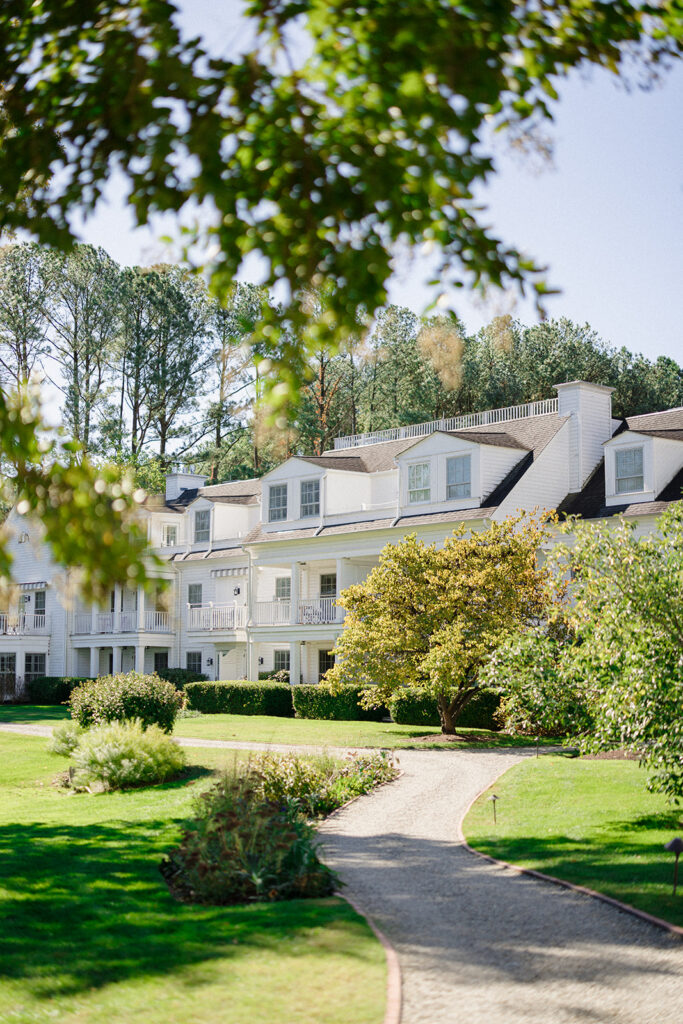 Catherine and Taylor’s fall wedding ceremony at the Inn at Perry Cabin in St. Michaels Maryland overlooking the Chesapeake Bay