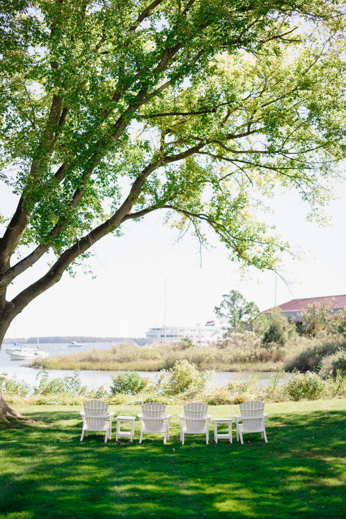 Catherine and Taylor’s fall wedding ceremony at the Inn at Perry Cabin in St. Michaels Maryland overlooking the Chesapeake Bay