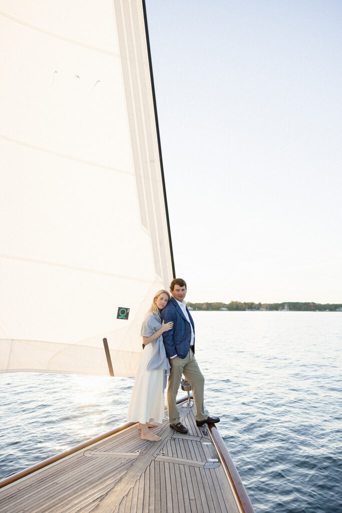 Chesapeake Bay engagement session with Catherine and Taylor sailing during their Maryland waterfront engagement photos