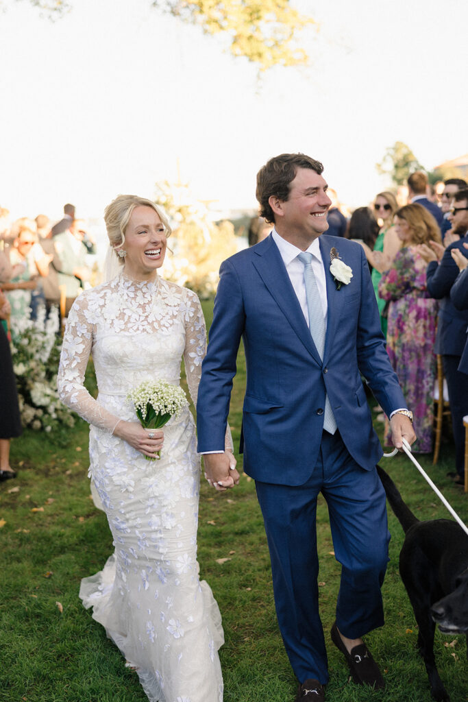 Catherine and Taylor’s fall wedding ceremony at the Inn at Perry Cabin in St. Michaels Maryland overlooking the Chesapeake Bay