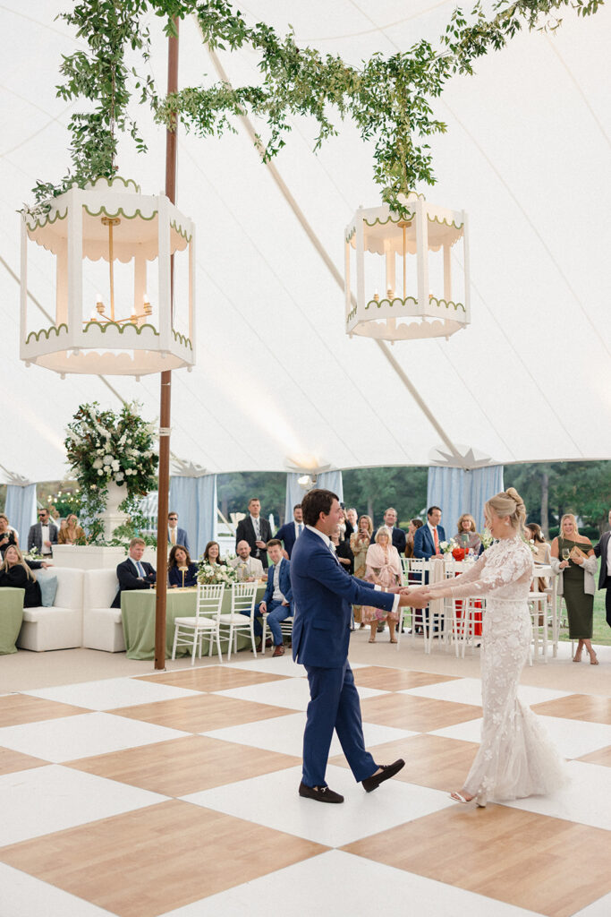 Sailcloth tent wedding reception at the Inn at Perry Cabin in St. Michael's, Maryland, overlooking the Chesapeake Bay during Catherine and Taylor's fall wedding.