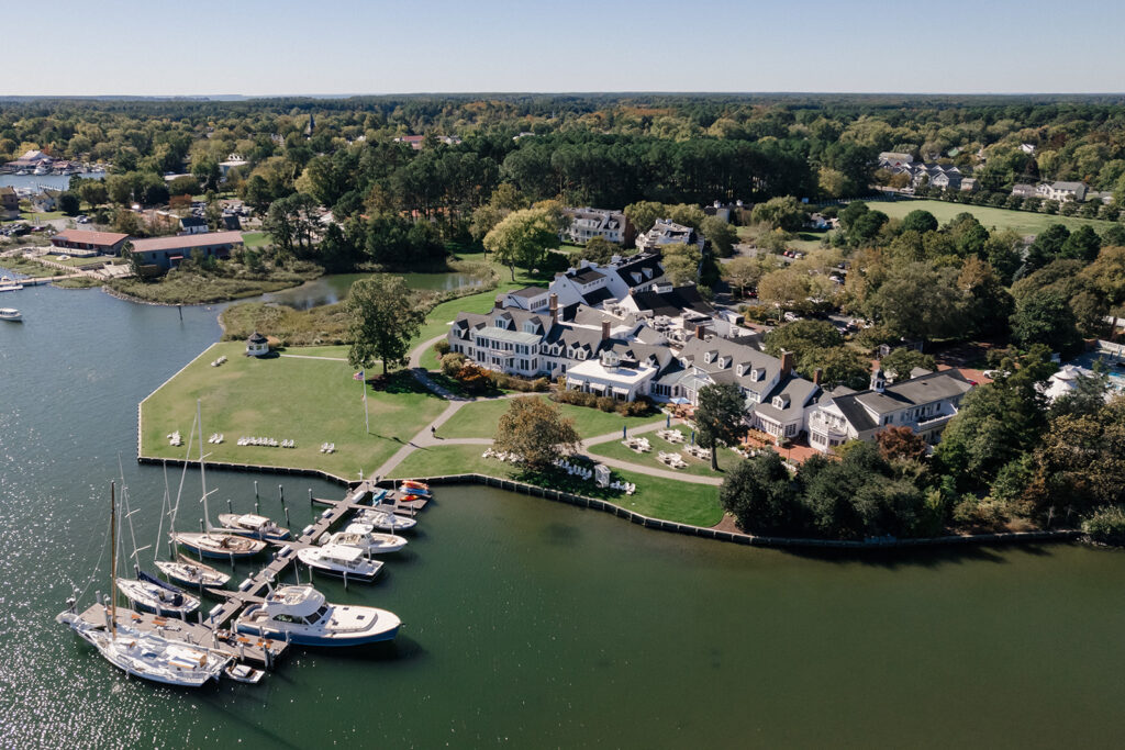 Catherine and Taylor’s fall wedding ceremony at the Inn at Perry Cabin in St. Michaels Maryland overlooking the Chesapeake Bay