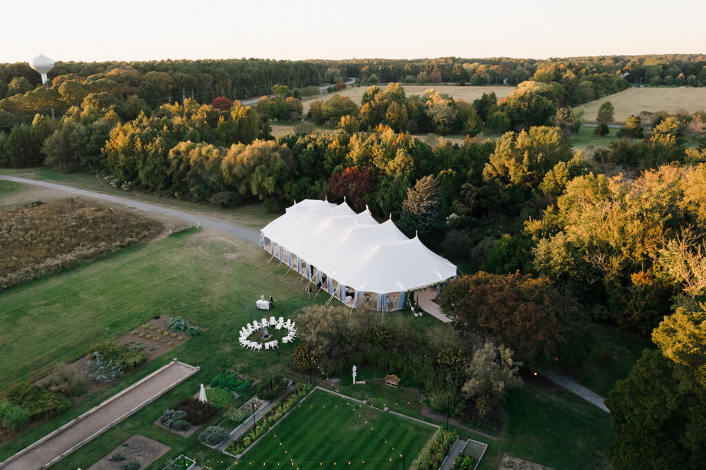 Sailcloth tent wedding reception at the Inn at Perry Cabin in St. Michael's, Maryland, overlooking the Chesapeake Bay during Catherine and Taylor's fall wedding.